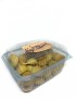 Clear plastic container filled with golden brown traditional Eid Maamoul cookies.