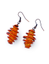 Pair of orange Aqeeq gemstone earrings in copper wire coil wrap.