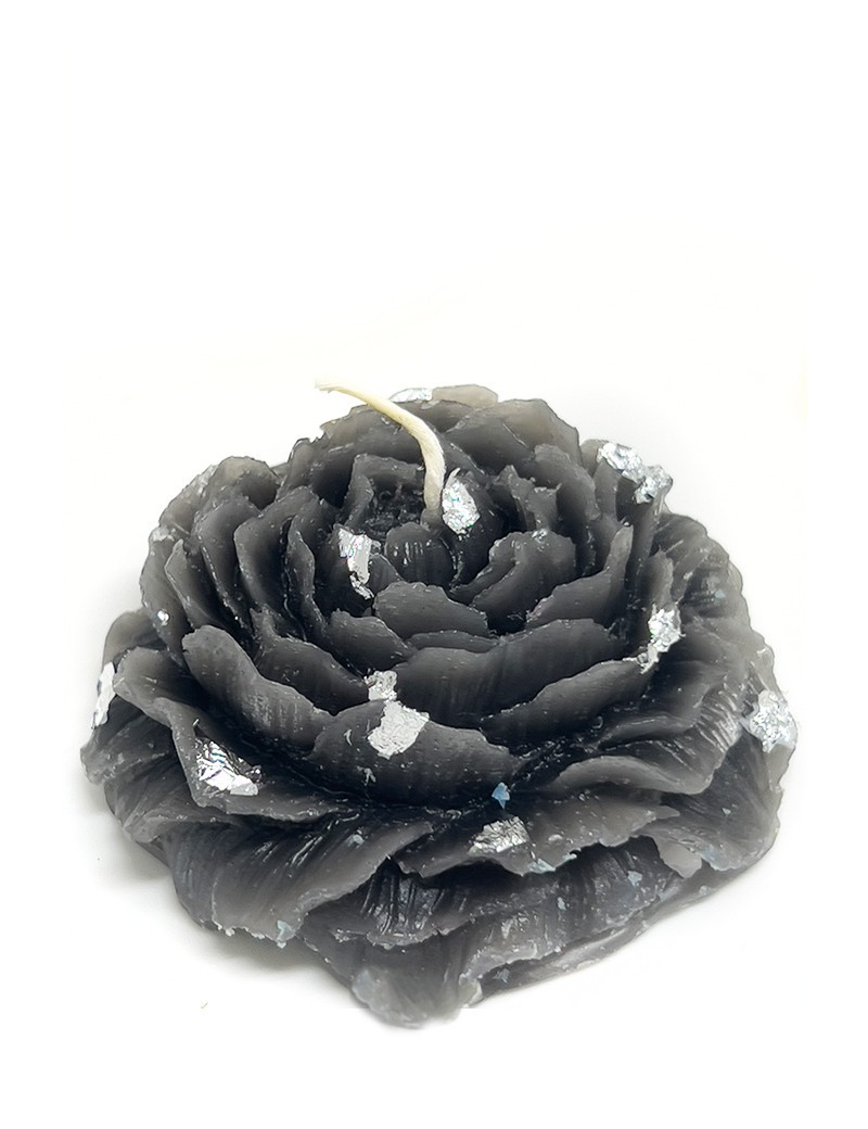 Grey rose-shaped candle with silver leaf accents and white wick.