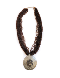 Multi-strand amber brown beaded necklace with silver pendant.