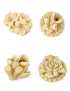An assortment of four different floral-shaped marzipan treats, including roses and calla lilies with pistachio accents.