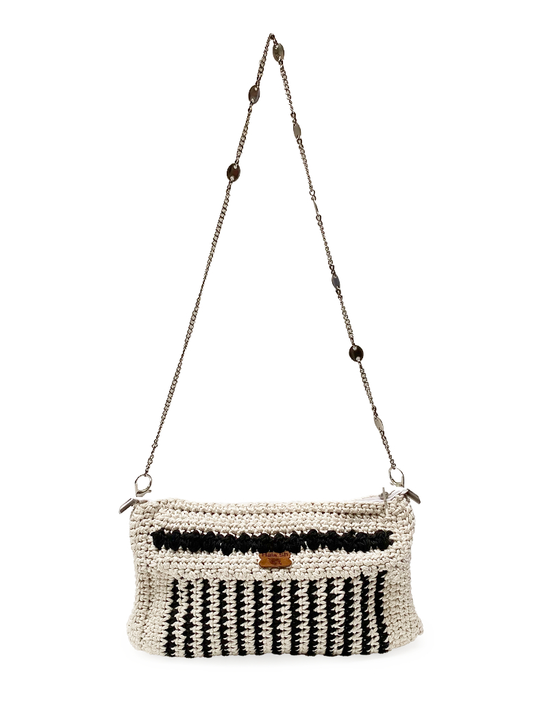 Front view of a handmade crochet crossbody bag with silver chain strap.