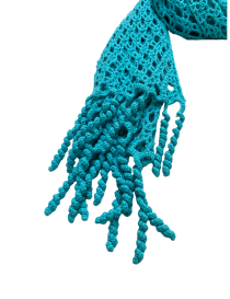 Handmade spiral corkscrew tassels on turquoise cotton scarf.