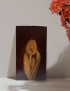 Handcrafted Calla Lily pyrography artwork on an A4 wood panel against a neutral wall.