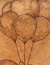 Close-up of woodburned balloons showing detailed pyrography texture.