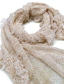 Detailed view of handmade spider lace crochet pattern on a natural silk scarf.