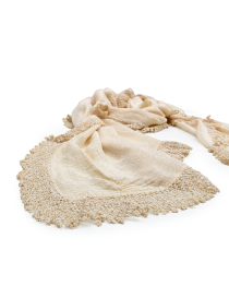 Wide angle view of the handmade silk scarf laid out on a white surface.