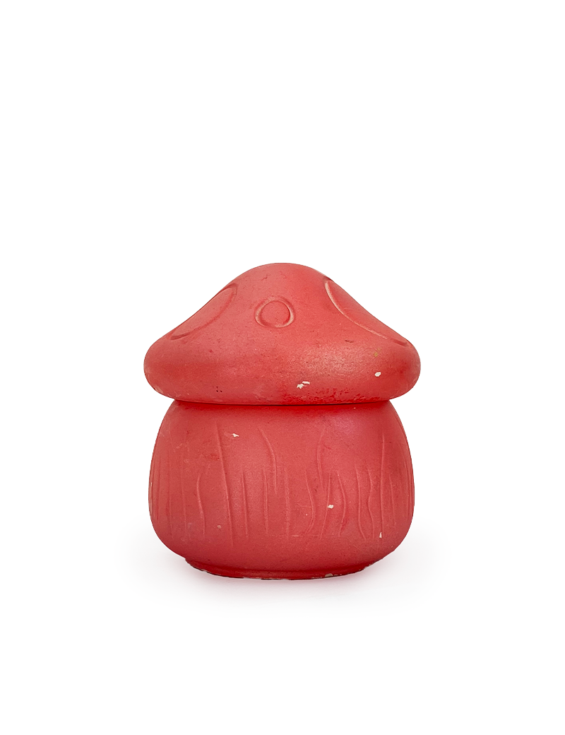 Red mushroom-shaped concrete candle jar with lid.