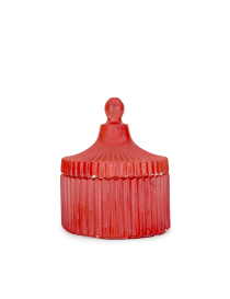 Red fluted concrete trinket jar with pointed lid closed.