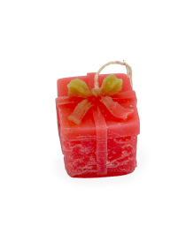 Top view of Christmas gift candle showing gold ribbon and wick.