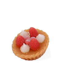 Top view of a strawberry tart scented candle with wax fruit.