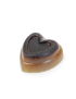Top-angled view of a rustic, handmade heart soap with natural lavender infusions.