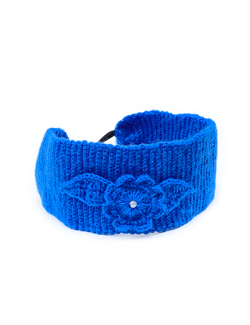 Front view of blue crochet floral headband showing the elasticated back loop.