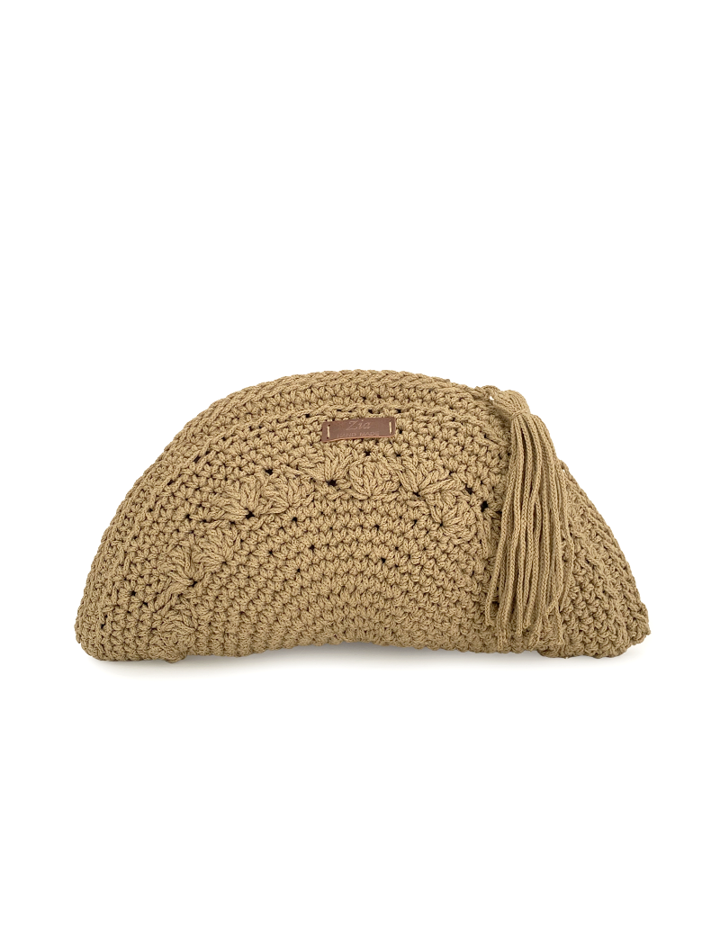 Front view of a beige handmade half-circle crochet clutch with a large tassel.