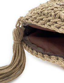 Interior view showing the dark brown fabric lining and secure zipper closure.