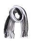 Hand-knitted men's scarf in black, grey, and white stripes styled in a knot.