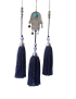 Detail of the three navy blue silk tassels and the Hamsa hand pendant.