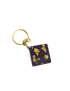Square black resin keychain with shimmering gold leaf flakes and gold-tone metal ring.