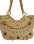 Closeup of handmade beige jute handbag featuring boho beadwork, floral details, and wooden ring handles.