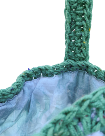 Teal and lavender mesh crochet bag with fabric lining and long shoulder straps.