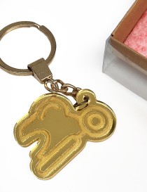 Gold mirror acrylic keychain with custom laser-cut design.