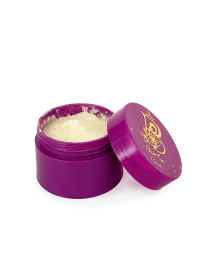 Open jar of Frankincense treatment cream showing texture.