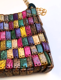 Detail shot of multicolored polished wooden tile mosaic pattern.