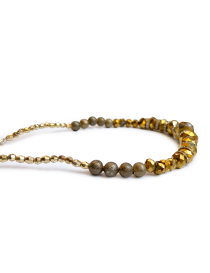 Side view showing gold-tone faceted and pyrite-style beads.