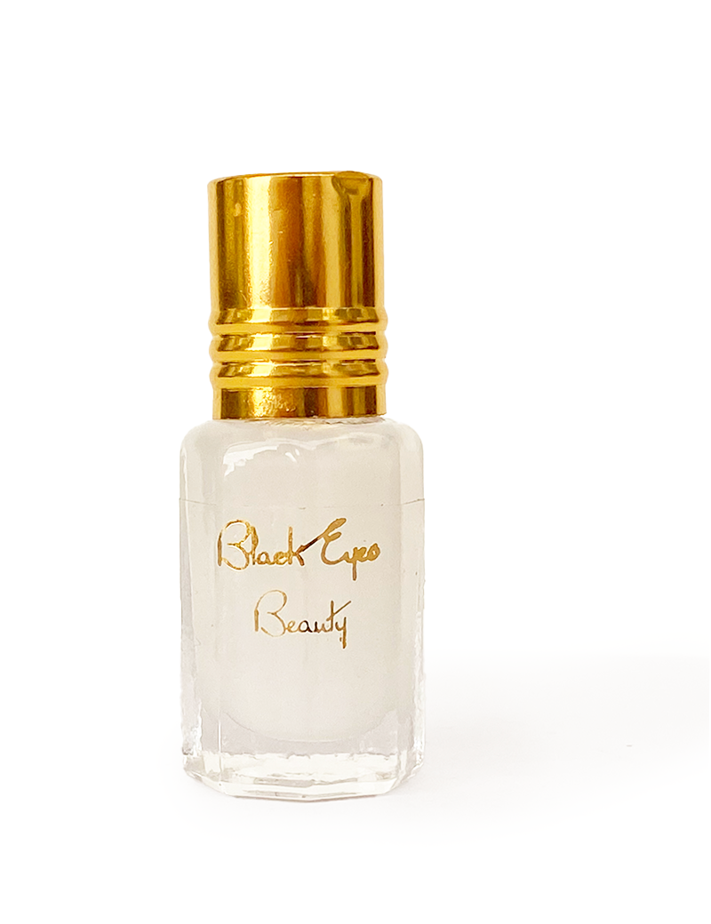 Black Eyes Beauty Purity Musk 10ml perfume oil with gold cap.