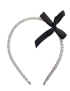 Classic white pearl headband with a black satin side bow.