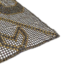 Corner detail of large handcrafted beaded table mat.