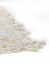 Close-up of the scalloped zigzag border of the beaded lace doily.