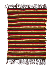 Full view of handmade earthy Kilim rug with red, brown, and yellow stripes.
