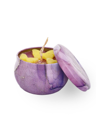 Side profile of purple marble candle tin with yellow butterfly embeds and cotton wick visible.