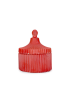 Red fluted concrete trinket jar with pointed lid closed.
