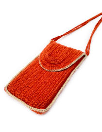 Angled view of the handmade phone sleeve with cream-colored border detailing.