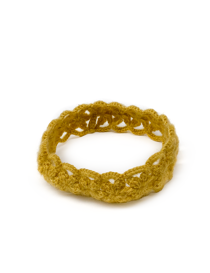 Mustard yellow floral crochet headband for women.
