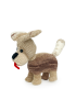Side profile of a handmade crochet puppy with brown gradient fur and a red tongue.