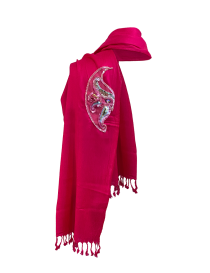 Vibrant fuchsia Turkish linen shawl featuring a handcrafted beaded mask motif and tassel edges.