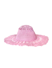 Profile view of a wide-brimmed pink crochet sun hat for women.