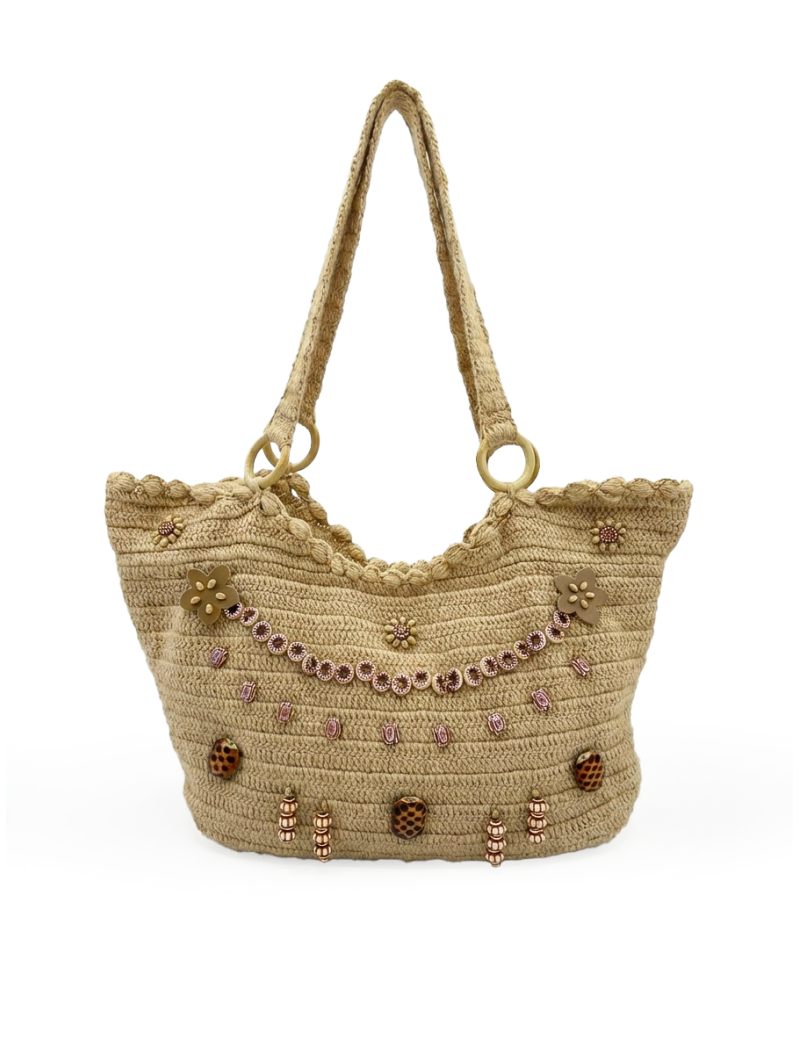 Handmade beige jute handbag featuring boho beadwork, floral details, and wooden ring handles.