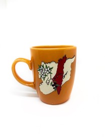 Orange handcrafted ceramic mug featuring a 3D map of Syria and white jasmine flowers.