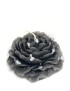 Grey rose-shaped candle with silver leaf accents and white wick.