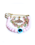 Gold baby pin with pink beads, blue eye charm, and Arabic calligraphy pendant.