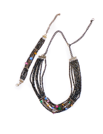 Full view of the Night Gems black beaded necklace and matching bracelet.