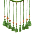 Row of braided green cords with decorative wooden beads and yarn tassels.