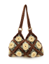 Front view of a brown handmade crochet bag with 3D cream rose floral patterns.