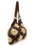 Side profile of the floral crochet tote bag showing its depth and textured pattern.
